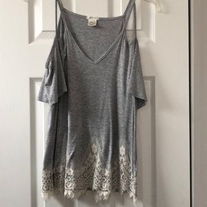 Grey tee, open shoulder